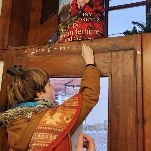 Tuisco schrebt Segen in Buchhandlung Goerke